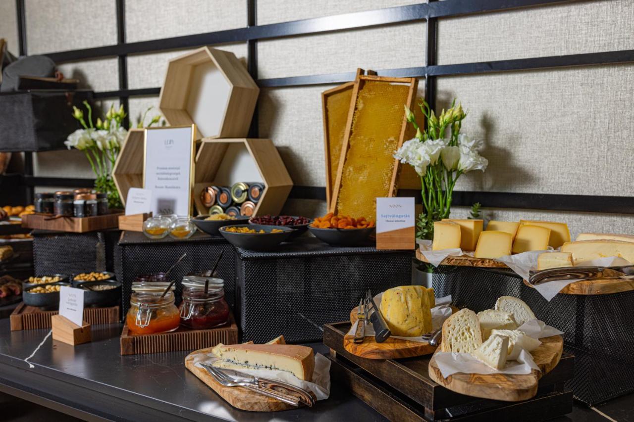 Lua Resort - Adults Only Балатонфюред Экстерьер фото Cheese and honey at a buffet